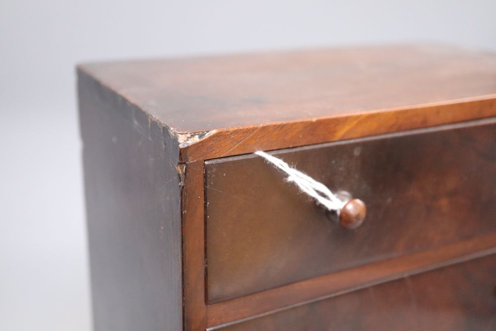 A mahogany Apprentice three drawer chest, height 25cm